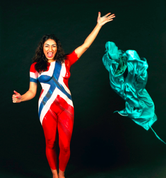 Figure 1
                        Shabana Rehman, a Pakistani-Norwegian comedian and public figure, throws off her traditional Pakistani clothing in favour of revealing her naked body painted with the Norwegian flag.