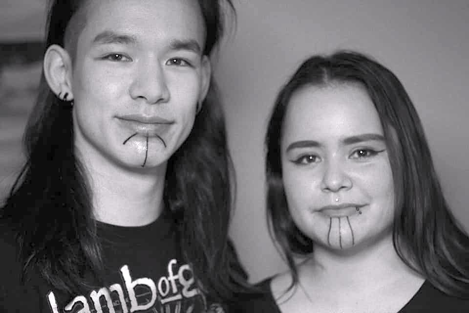 Figure 1: Pani Enequist (right) and her husband, Sebastian Enequist (left), after receiving their Inuit tattoos. 
                          Photographer: Paninnguaq Lind Jensen.